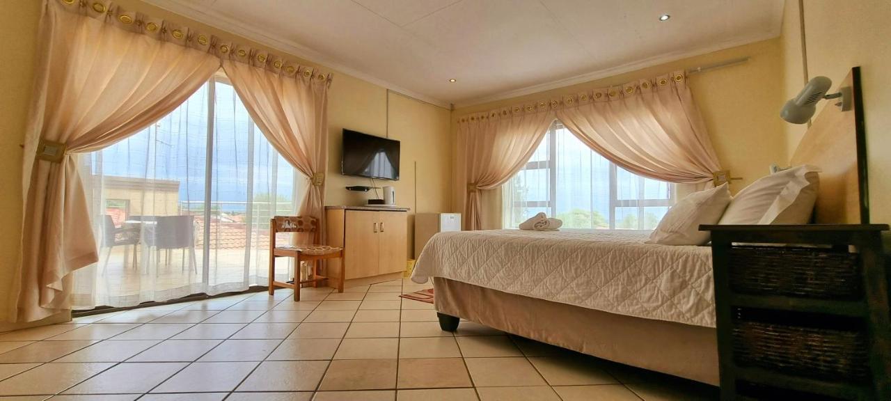 Asda Guesthouse Mogwase Bagian luar foto